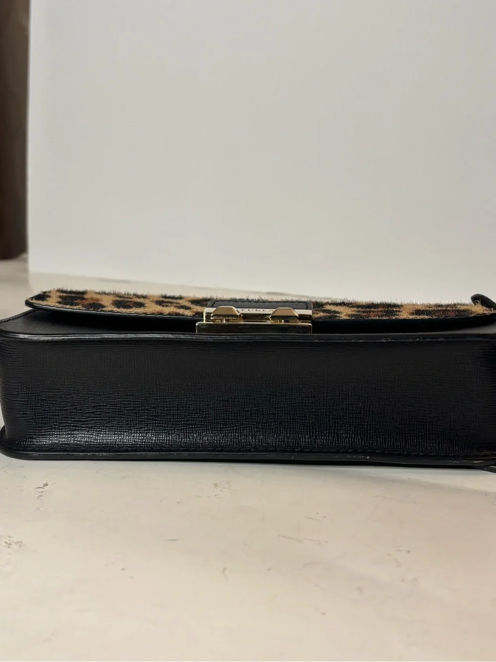 Furla Bella mini crossbody with leopard print calf hair and leather. Adjustable